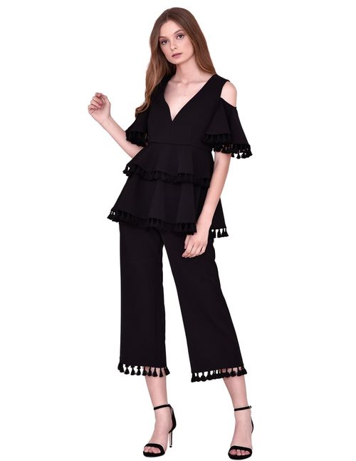 Top and pants set with ruffles and tassels