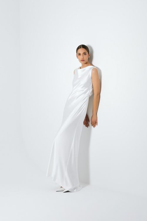 Long wedding dress with draped back and skirt with train