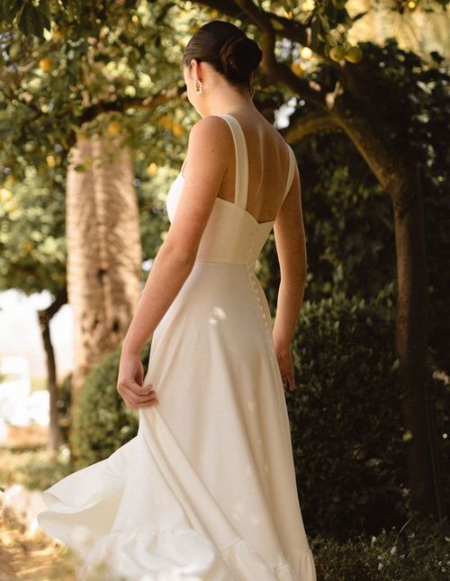 Long wedding dress with straps, sweetheart neckline and flared skirt