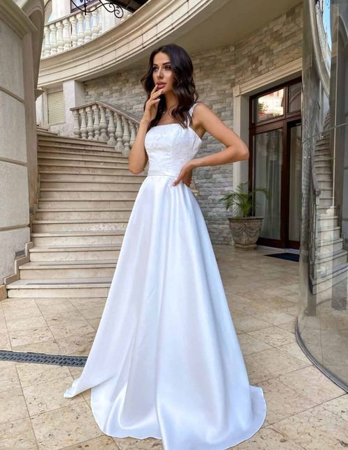 Long wedding dress with wide straps and square neckline