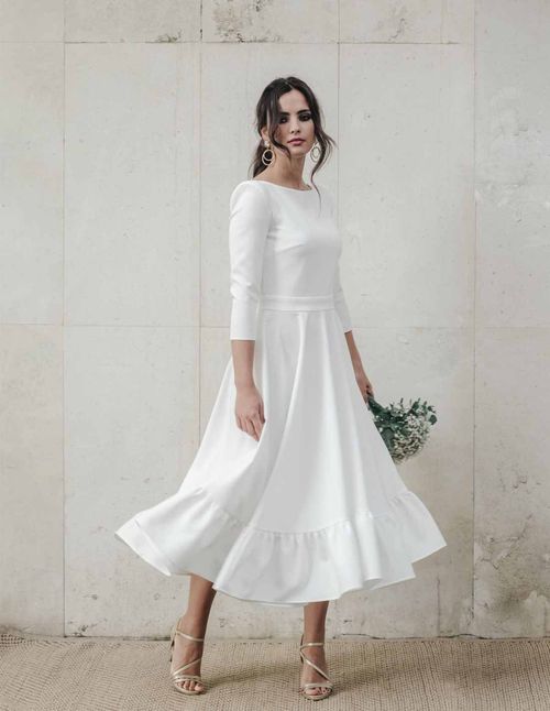 Midi wedding dress with asymmetric ruffle skirt