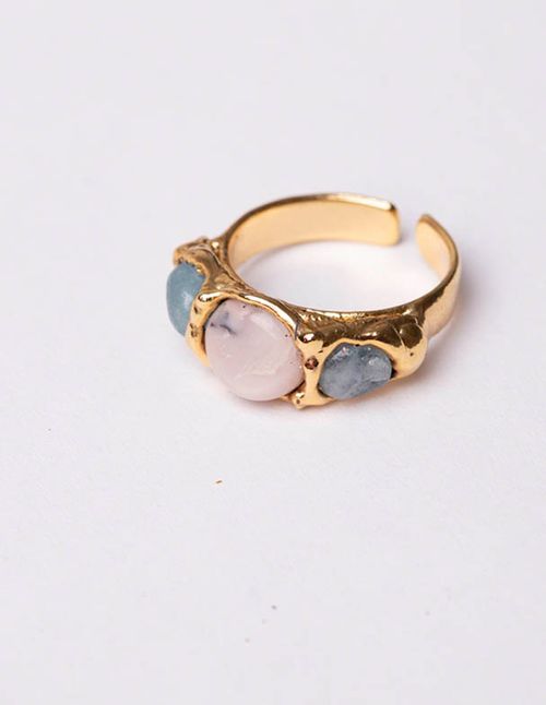 Ring with natural colored stone