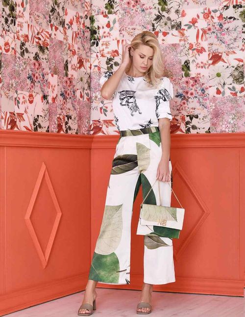Leaf print palazzo pants in shades of green and white