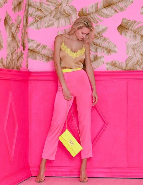 Party jumpsuit combined with fluorescent lace and cropped pants
