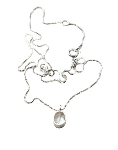 Silver pendant with white quartz set