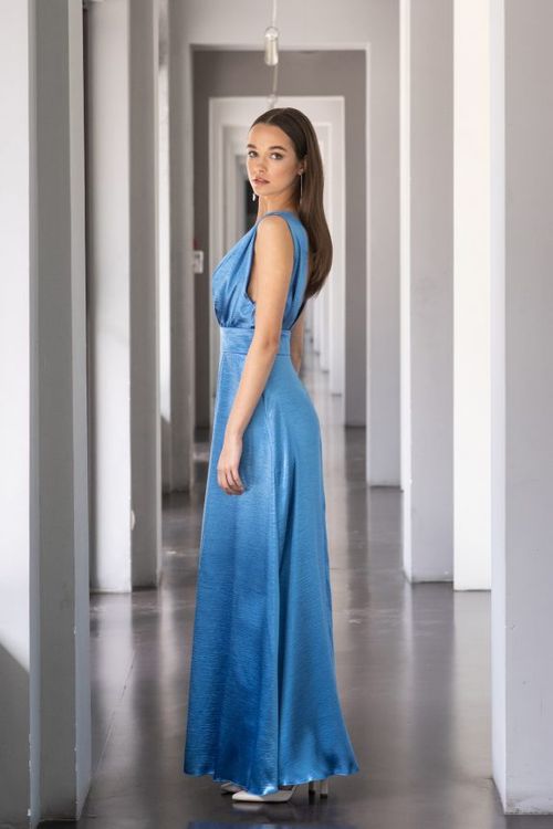 Long blue party dress with plunging neckline and opening