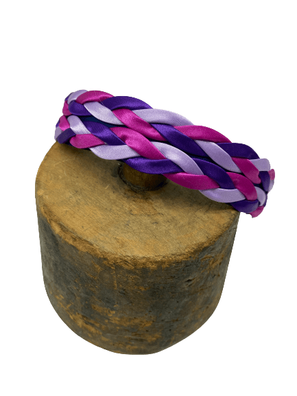 Spaghetti braided headband in shades of purple, fuchsia and mauve