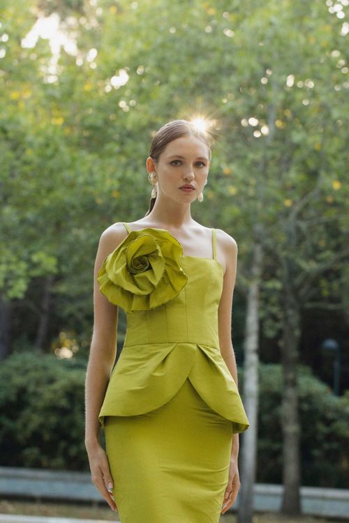 Pistachio green taffeta top with straps and floral decoration